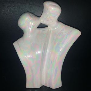 Iridescent lovers statue